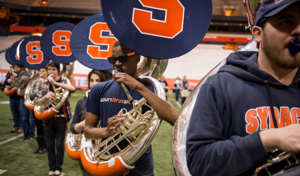 Morgan Christopher Edwards, a senior aerospace engineering major, performs in the tuba line during practice in the Carrier Dome the week before the Super Bowl.