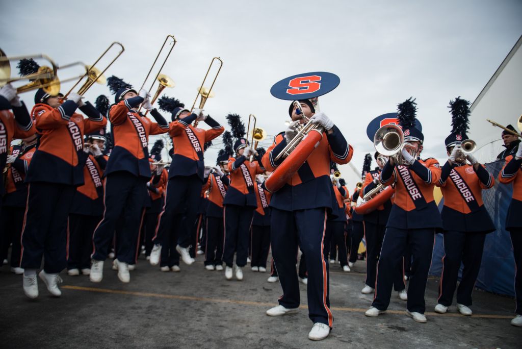 Members of the band are barely able to contain themselves during warm-ups outside of MetLife Stadium before the Super Bowl on Sunday evening. "They're fired up," Mertz said.