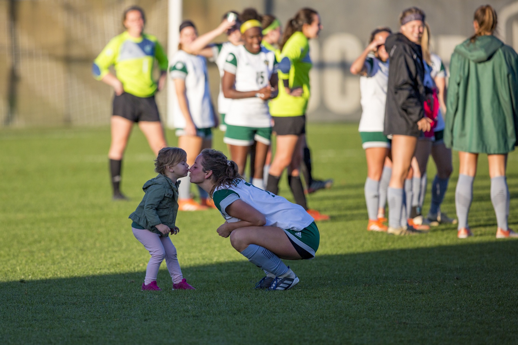 Ohio University midfielder Jenni Santacaterina, of Geneva, Ill., celebrates with her niece, Audrey Manny, 2, and her mother, Jackie Manny, after the Ohio University Womens Soccer game against Central Michigan University on Friday, October 18, 2019. Ohio University won the game 2-1.